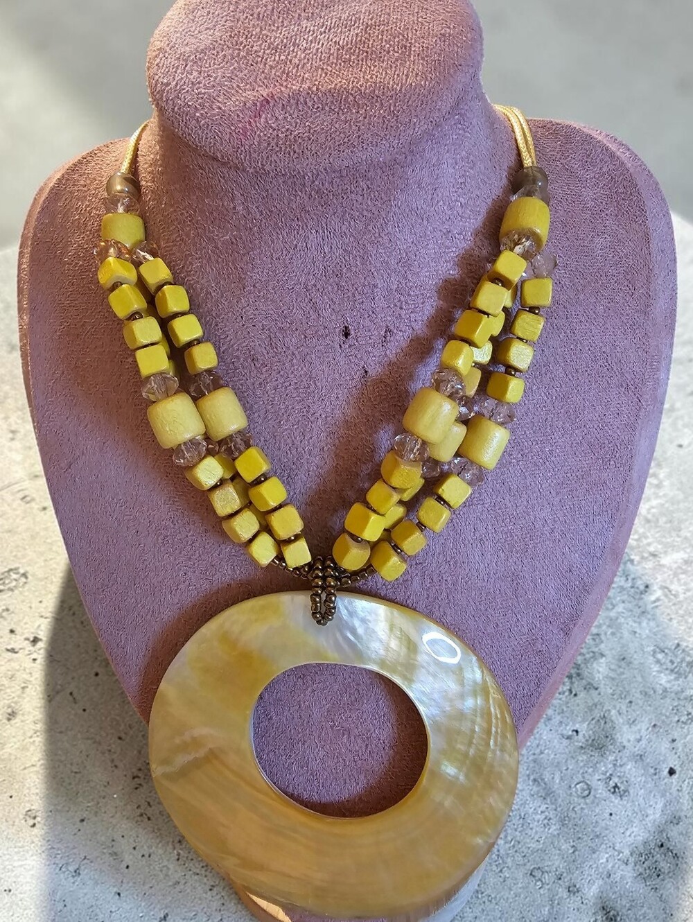 Sassified. Boutique Yellow Statement  Necklace with Circular Shell Pendant